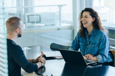 People smiling in an office