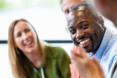 People smiling in an office